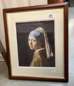 A framed and glazed print of a lady, Girl With Pearl Earring.
