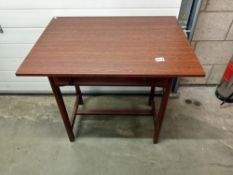 A hall table with drawer