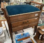 An Edwardian piano stool with 2 drawers