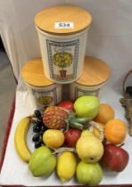 A set of 'Oranges & Lemons' Tea, coffee & Sugar cannisters & A quantity of plastic fruit