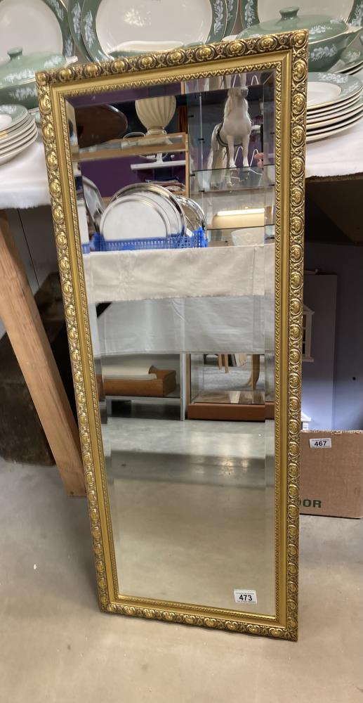 A gilt framed hall mirror 96 x 36cm