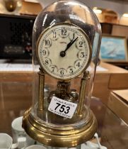 A 'Capitol' anniversary clock under dome.