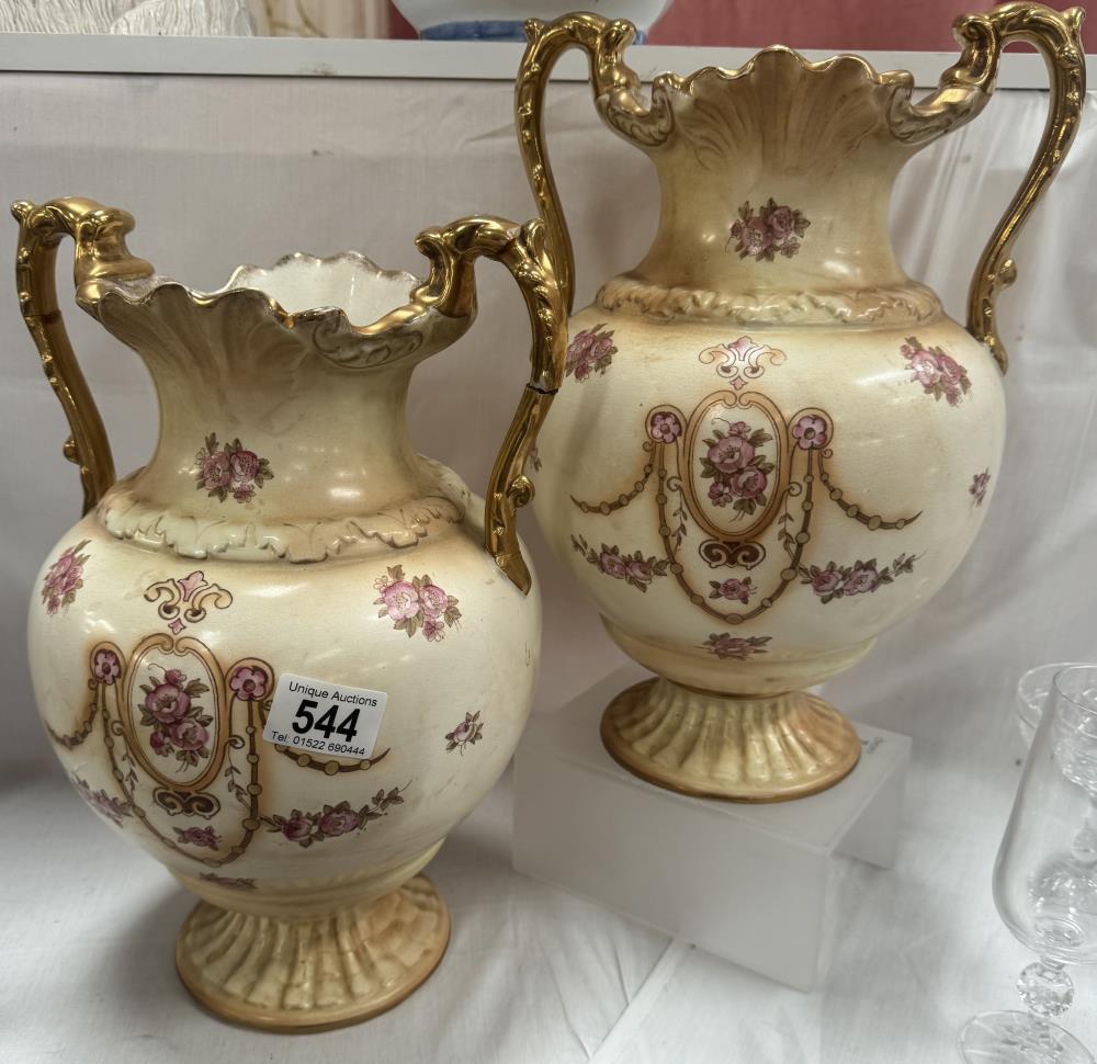 A pair of crown devon 2 handled vases A/F