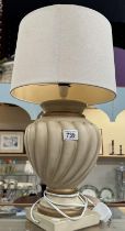 A large pottery table lamp