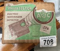 A vintage boxed 'The Philatector' Electric watermark detector for stamps