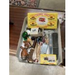 A mixed lot including old pipe, pen knives, matchbox cars etc