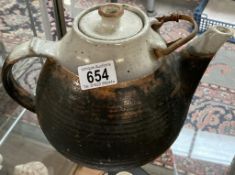 A large pottery studio teapot