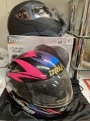 A boxed flip - up motorcycle helmet (Appears new, box is A/F) & A driver motorcycle helmet Size XL &