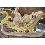 A Porcelain lady in swan carriage