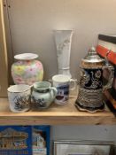 A quantity of pottery including vases and steins
