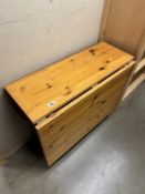 A Drop leaf pine kitchen table