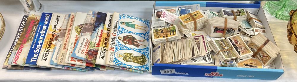 A quantity of collectors cards in albums & A large lot of loose cards