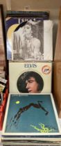 A large collection of LPs including Elvis, Steve Winwood etc