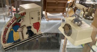A Musical telephone lighter & A Mother Hubbard money box