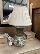 A green glazed pottery table lamp