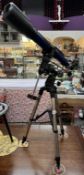 A Bresser Sky live telescope on tripod stand