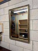 An ornate gilt framed bevel edged mirror 58 x 82cm