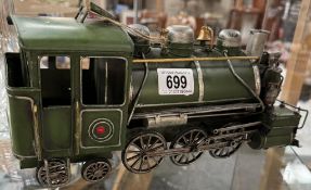 A large tin plate model of a steam train. Length 34cm