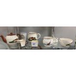 A quantity of Torquay ware items including teapots, milk, sugar etc
