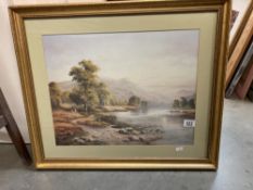 A large gilt framed picture of a country scene