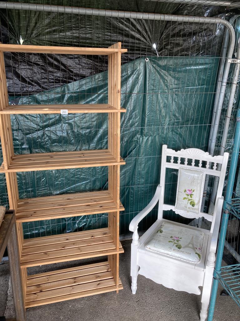 A pine slatted shelf unit and painted storage chair