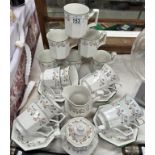 A 16 piece tea set with milk jug & sugar bowl with 6 matching mugs