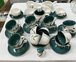 A quantity of Denby 'GreenWheat' cups & saucers, soup bowls etc