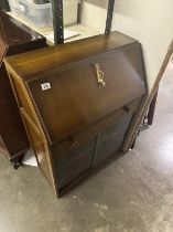 A 1930's front bureau / cabinet with lock & key