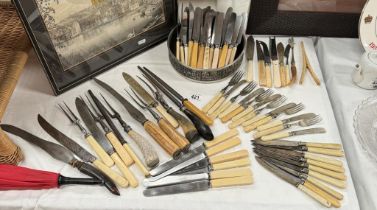 A selection of vintage flatware / cutlery & carving knives & forks