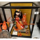 A Japanese water-bearer doll in a glassless case (Case frame only part disassembles)
