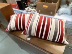 2 cushions with feather inserts