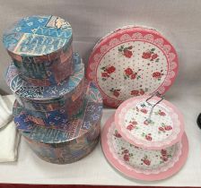 A boxed tiered cake stand & a set of 3 decorative boxes