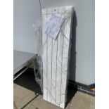 A large wall radiator (Missing wall brackets)