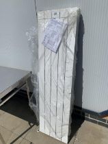 A large wall radiator (Missing wall brackets)