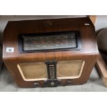 A vintage HMV radio with power cord & plug