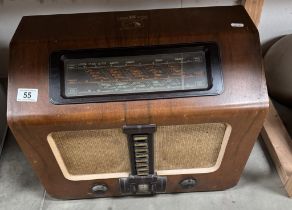 A vintage HMV radio with power cord & plug