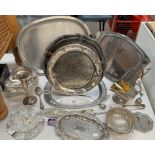 A quantity of metalware, mainly silver including plates, trays, utensils, vase etc