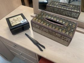 A musical jewellery box, ornate tissue box cover and pair of glove stretchers