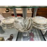 A 25 piece fine bone china dinner set by Crown Staffordshire