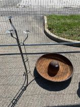 A circular metal poultry feeder & metal candle stand