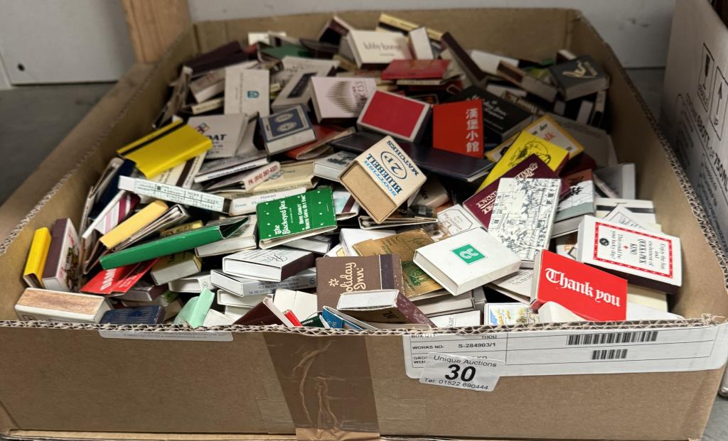 A large collection of match books & match boxes