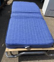 A 3' Folding bed with cover condition as new