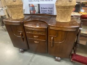 A 1930's oak sideboard