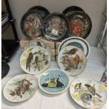 A quantity of boxed collectors plates including Songbirds, When in Rome by Norman Rockwell etc