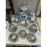 A Royal Doulton coffee set with coffee pot and 2 tea sets
