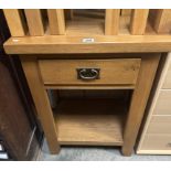 A teak side table with one drawer 60 x 44 x 79cm