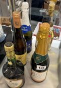 6 Bottles of alcoholic drinks including white wine, sherry, bucks fizz etc