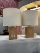 A pair of pine-based table lamps
