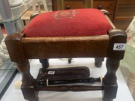 A solid oak foot stool