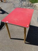 A vintage kitchen table with Formica top